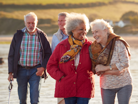Women walking on boardwalk